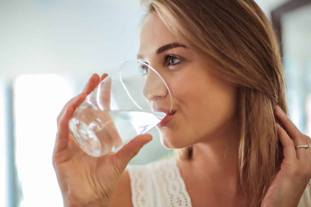 Tips to address dry lips include drinking more water