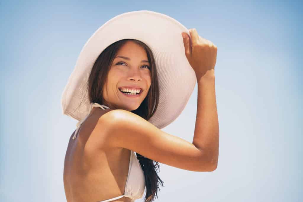 A sun hat says style and with spf equals best care for skin